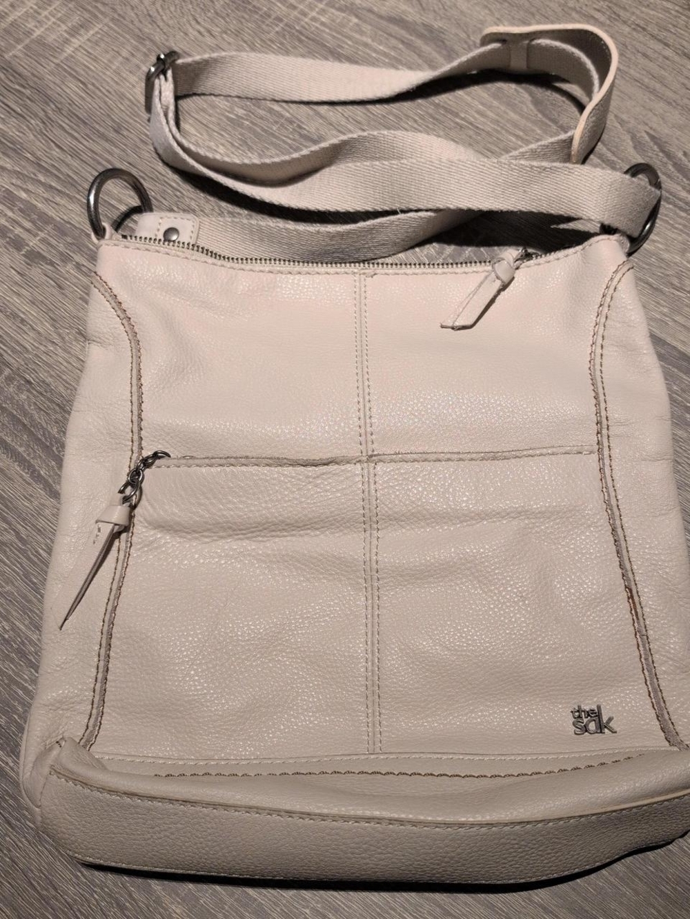 The Sak crossbody bag made of off-white ultra soft pebbled leather. Like new